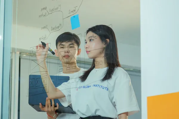 Students working with laptops