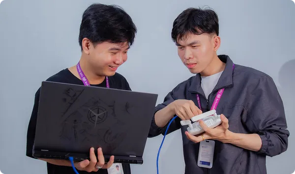 Students working with laptops